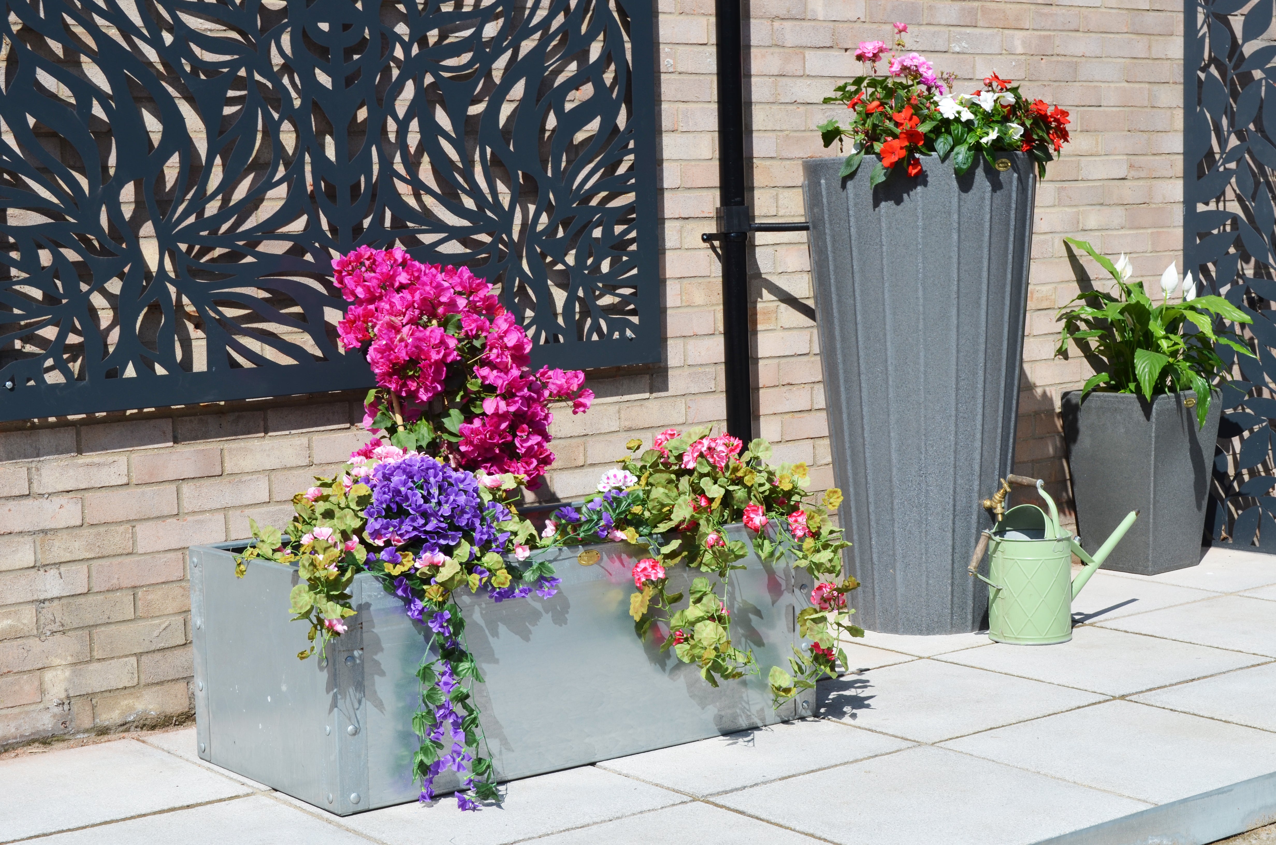 raised bed - water butt planter - garden planter and watering can